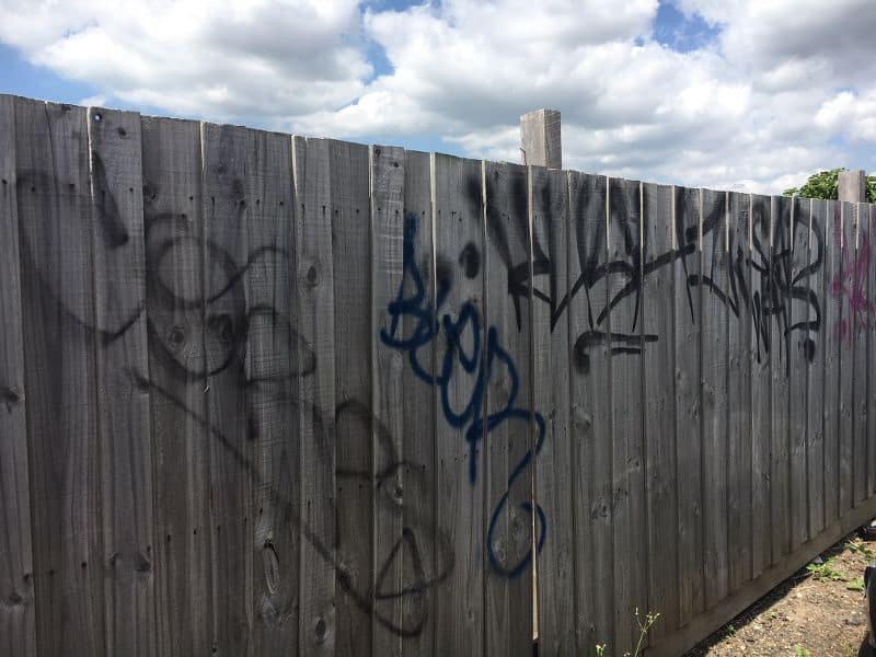 Graffiti on a timber fence