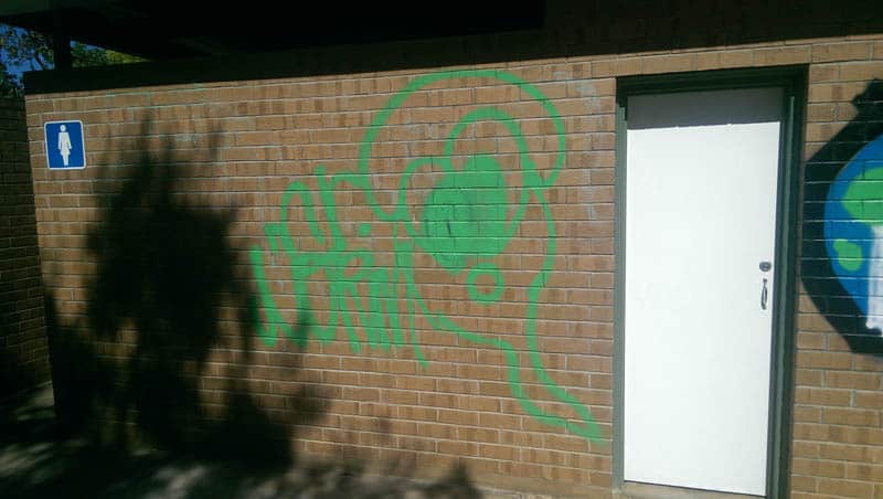 Womens toilet block wall after being sandblasted