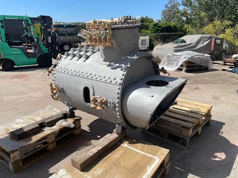 sandblasting an old navy engine back to a shiny exterior