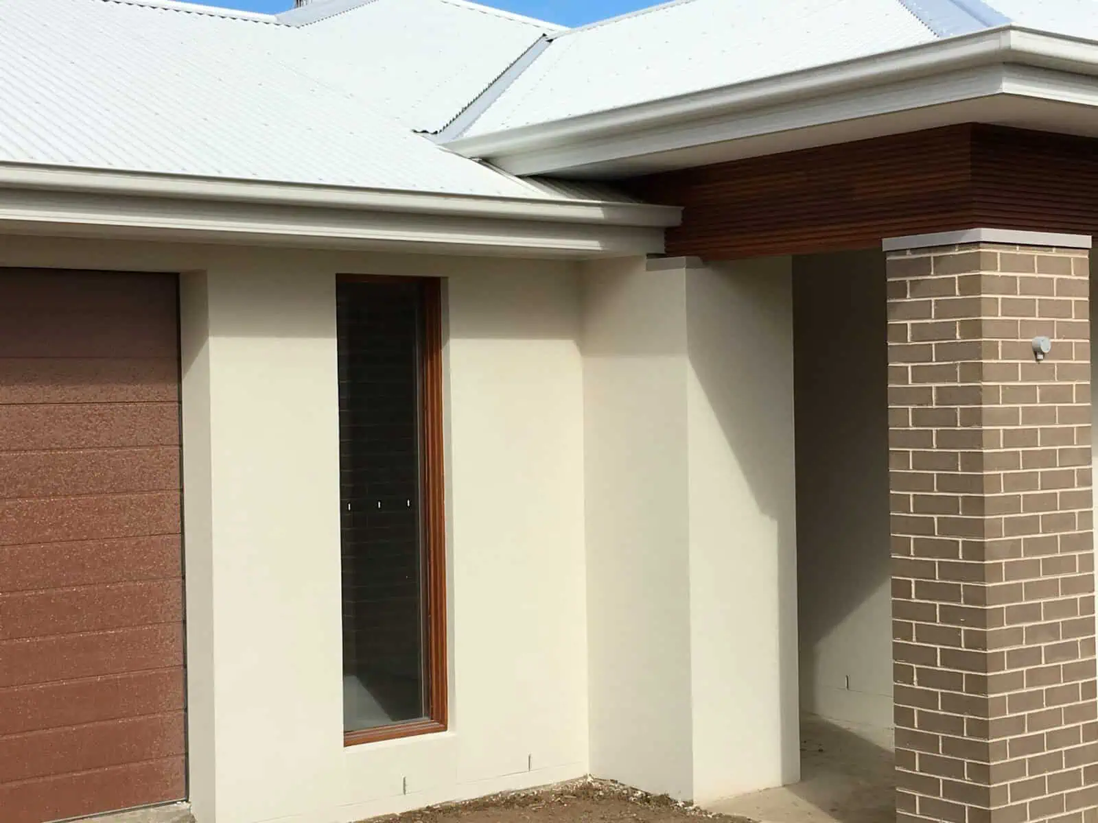 rendering cracks front of house